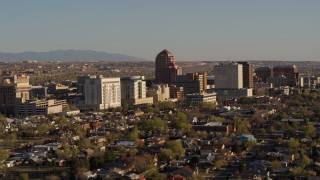 5.7K aerial stock footage of flying by the office high-rise buildings in Downtown Albuquerque, New Mexico Aerial Stock Footage | DX0002_122_019