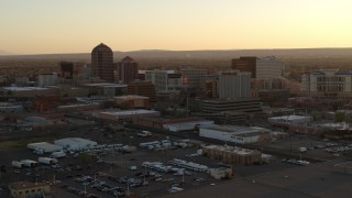 5.7K aerial stock footage pass and then approach high-rise office buildings at sunset, Downtown Albuquerque, New Mexico Aerial Stock Footage | DX0002_122_044