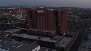 5.7K aerial stock footage of an orbit of a hospital at sunset in Albuquerque, New Mexico Aerial Stock Footage | DX0002_123_004