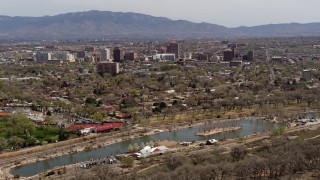 5.7K aerial stock footage wide view of high-rise office buildings seen from Tingley Beach, Downtown Albuquerque, New Mexico Aerial Stock Footage | DX0002_124_003