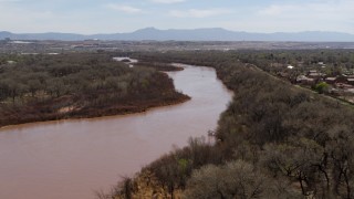 DX0002_124_014 - 5.7K aerial stock footage of a reverse view of the Rio Grande river in Albuquerque, New Mexico