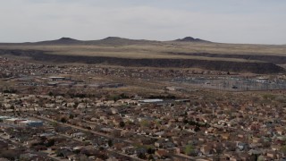 5.7K aerial stock footage of passing by a suburban neighborhood, Albuquerque, New Mexico Aerial Stock Footage | DX0002_126_017