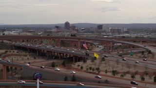 5.7K aerial stock footage ascend past freeway interchange to focus on Downtown Albuquerque, New Mexico Aerial Stock Footage | DX0002_126_019