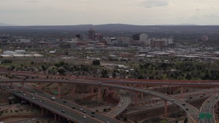 5.7K aerial stock footage approach freeway interchange, ascend for view of Downtown Albuquerque, New Mexico Aerial Stock Footage | DX0002_126_033