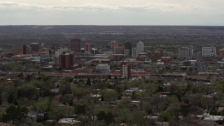 5.7K aerial stock footage of the city's high-rise buildings seen from neighborhood, Downtown Albuquerque, New Mexico Aerial Stock Footage | DX0002_126_036