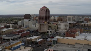 5.7K aerial stock footage orbiting the Albuquerque Plaza and neighboring city buildings, Downtown Albuquerque, New Mexico Aerial Stock Footage | DX0002_127_003