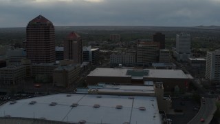 5.7K aerial stock footage orbit office high-rise, hotel, Kiva Auditorium at sunset, Downtown Albuquerque, New Mexico Aerial Stock Footage | DX0002_128_007