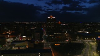 5.7K aerial stock footage orbit office high-rise and hotel at twilight, Downtown Albuquerque, New Mexico Aerial Stock Footage | DX0002_128_047