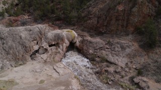 5.7K aerial stock footage approach and orbit river rapids flowing through a rock formation in the mountains in New Mexico Aerial Stock Footage | DX0002_129_007