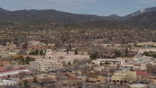 5.7K aerial stock footage of flying by Bataan Memorial Building in the city's downtown area, Santa Fe, New Mexico Aerial Stock Footage | DX0002_129_038