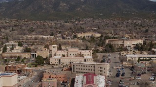 5.7K aerial stock footage of an orbit of state government buildings near capitol building, Santa Fe, New Mexico Aerial Stock Footage | DX0002_129_040