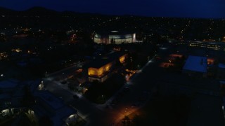 DX0002_132_021 - 5.7K aerial stock footage view approach and orbit New Mexico State Capitol at night, Santa Fe, New Mexico