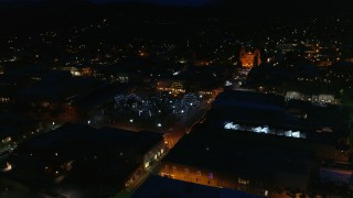 5.7K aerial stock footage reverse view of Santa Fe Plaza near the cathedral at night, Santa Fe, New Mexico Aerial Stock Footage | DX0002_132_029