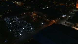 5.7K aerial stock footage of trees lit up at night in Santa Fe Plaza, Santa Fe, New Mexico Aerial Stock Footage | DX0002_132_031