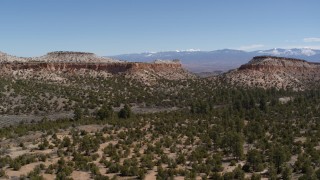 5.7K aerial stock footage of slowly flying toward desert mesas in New Mexico Aerial Stock Footage | DX0002_133_008