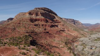 5.7K aerial stock footage orbit the side of a large butte with steep slopes, New Mexico Aerial Stock Footage | DX0002_135_006