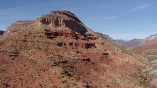 5.7K aerial stock footage of approaching the side of a large butte with steep slopes, New Mexico Aerial Stock Footage | DX0002_135_007