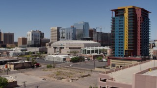 5.7K aerial stock footage of flying by the arena to reveal condo complex in Downtown Phoenix, Arizona Aerial Stock Footage | DX0002_136_005