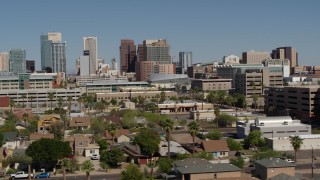 5.7K aerial stock footage of flying toward and past  high-rise office buildings in Downtown Phoenix, Arizona Aerial Stock Footage | DX0002_137_031