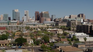 5.7K aerial stock footage slowly flying past high-rise office buildings in Downtown Phoenix, Arizona Aerial Stock Footage | DX0002_137_032