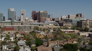 5.7K aerial stock footage fly away from tall office buildings in Downtown Phoenix, Arizona Aerial Stock Footage | DX0002_137_035