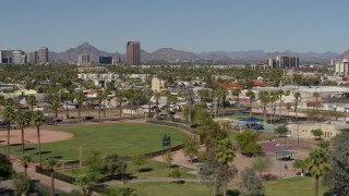 DX0002_137_048 - 5.7K aerial stock footage BMO Tower seen from University Park in Phoenix, Arizona