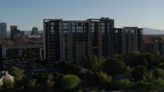 5.7K aerial stock footage of approaching a condominium complex in Downtown Phoenix, Arizona Aerial Stock Footage | DX0002_138_022