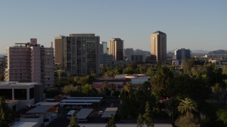 5.7K aerial stock footage of high-rise apartment buildings near tall office buildings in Phoenix, Arizona Aerial Stock Footage | DX0002_138_040