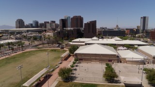 5.7K aerial stock footage of orbiting a charter school to reveal city's skyline in Downtown Phoenix, Arizona Aerial Stock Footage | DX0002_140_002