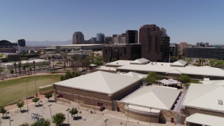 5.7K aerial stock footage flyby the city's skyline to reveal a charter school in Downtown Phoenix, Arizona Aerial Stock Footage | DX0002_140_004