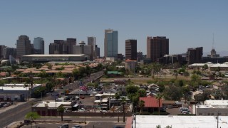 5.7K aerial stock footage fly parallel to Van Buren street to approach the city's skyline, Downtown Phoenix, Arizona Aerial Stock Footage | DX0002_140_014