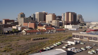 5.7K aerial stock footage approach and flyby train station with view of skyline in Downtown Phoenix, Arizona Aerial Stock Footage | DX0002_142_018