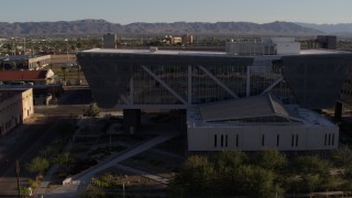 5.7K aerial stock footage orbit parking garage and reveal Maricopa County Sheriff’s Office at sunset, Downtown Phoenix, Arizona Aerial Stock Footage | DX0002_142_037