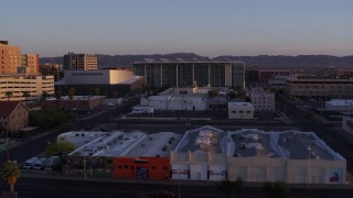 5.7K aerial stock footage of a performing arts theater, federal courthouse and TV station at sunset, Downtown Phoenix, Arizona Aerial Stock Footage | DX0002_143_038