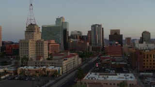 5.7K aerial stock footage of tall office towers and city streets at sunset, Downtown Phoenix, Arizona Aerial Stock Footage | DX0002_143_045