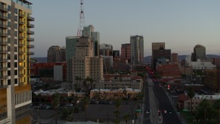 5.7K aerial stock footage of Westward Ho building and tall office towers at sunset, Downtown Phoenix, Arizona Aerial Stock Footage | DX0002_143_046