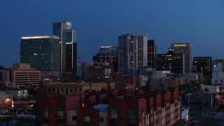 5.7K aerial stock footage of towering office buildings, seen from 1st and 2nd Avenue at twilight, Downtown Phoenix, Arizona Aerial Stock Footage | DX0002_143_058