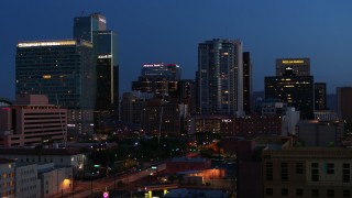 5.7K aerial stock footage approach and flyby high-rise office buildings at twilight, Downtown Phoenix, Arizona Aerial Stock Footage | DX0002_143_061