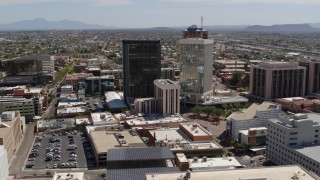 5.7K aerial stock footage of a wide orbit of office high-rise buildings in Downtown Tucson, Arizona Aerial Stock Footage | DX0002_144_004