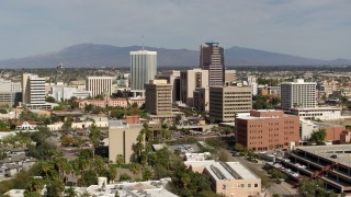 DX0002_144_030 - 5.7K aerial stock footage of tall high-rise office towers and city buildings in Downtown Tucson, Arizona