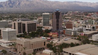 5.7K aerial stock footage reverse view of courthouse and office high-rises, Downtown Tucson, Arizona Aerial Stock Footage | DX0002_145_022