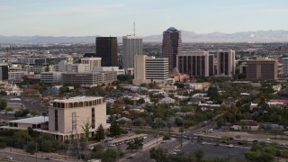 5.7K aerial stock footage slowly fly away from three office towers in Downtown Tucson, Arizona Aerial Stock Footage | DX0002_146_010