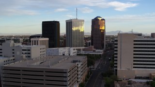 5.7K aerial stock footage of Bank of America Plaza and neighboring office towers during decent in Downtown Tucson, Arizona Aerial Stock Footage | DX0002_146_026