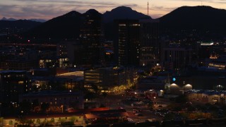 5.7K aerial stock footage of an orbit of three tall office towers at twilight, Downtown Tucson, Arizona Aerial Stock Footage | DX0002_147_035