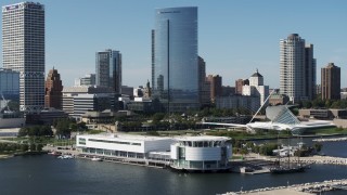 5.7K aerial stock footage of circling the Discovery World museum in Downtown Milwaukee, Wisconsin Aerial Stock Footage | DX0002_149_013