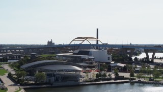 DX0002_149_016 - 5.7K aerial stock footage of flying away from concert venues in Downtown Milwaukee, Wisconsin