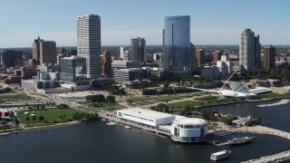 5.7K aerial stock footage of the city's skyscrapers seen from Discover World museum in Downtown Milwaukee, Wisconsin Aerial Stock Footage | DX0002_149_035