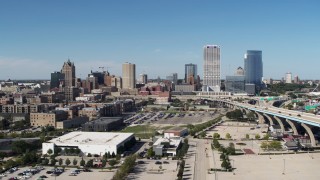 5.7K aerial stock footage of flying by and away from the city's skyline in Downtown Milwaukee, Wisconsin Aerial Stock Footage | DX0002_149_038