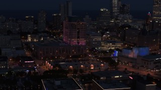 5.7K aerial stock footage orbit a downtown office building at night, Downtown Milwaukee, Wisconsin Aerial Stock Footage | DX0002_151_009