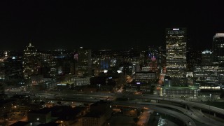 DX0002_151_026 - 5.7K aerial stock footage stationary view of downtown buildings and skyscraper at night, Downtown Milwaukee, Wisconsin